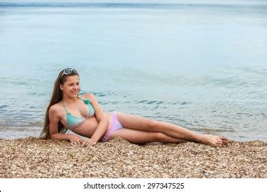 Brunette Tourist Lying Beach Sand Tanning Stock Photo