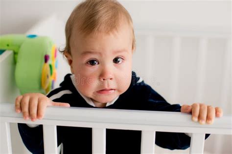 Baby Crying In The Crib Stock Image Image Of Emotion 49297203