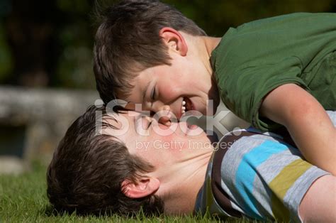 If you agree to our use of cookies, please continue to use our site. Two Boys Playing Together IN The Stock Photos - FreeImages.com