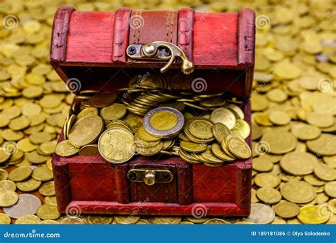 Vintage Treasure Chest Full Of Gold Coins On Background Of Golden Coins