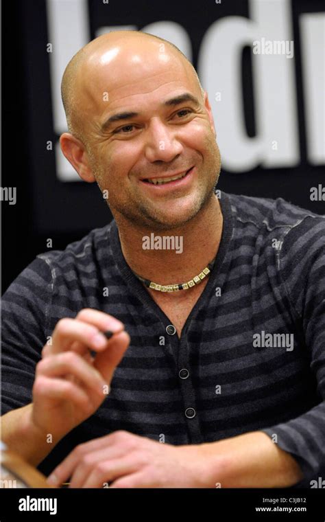 Andre Agassi Signs Copies Of His New Book Open At The Indigo
