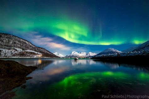 Northern Lights Over The Fjords Of Norway Tromso Norway