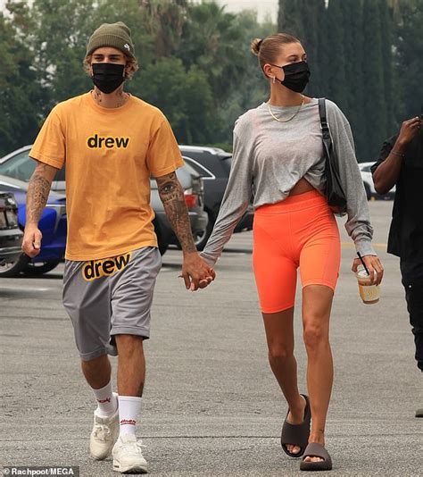 justin bieber reps his drew label while going to hot yoga with his wife hailey daily mail