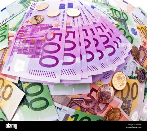 Many Euro Bills And Coins Stock Photo Alamy