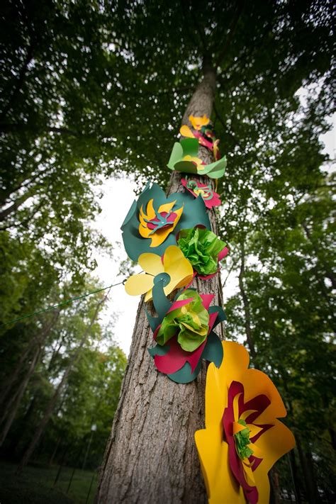 Handmade Paper Flowers Swirled Around The Tree