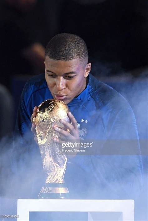 photo d actualité kylian mbappe celebrates with the world cup world cup trophy donatello