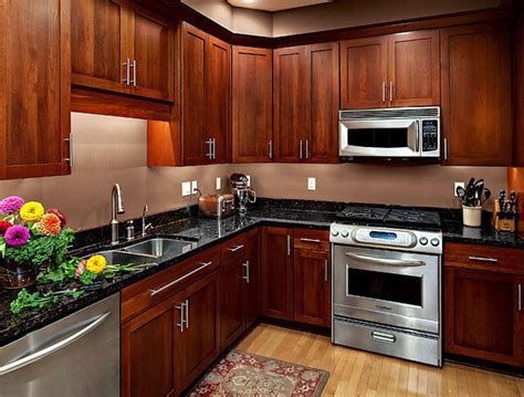 Amazing kitchen Design With Brown Wood Cabinet Designs - Dwell Of Decor