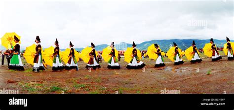 Yi Minority Women In Elaborate Ethnic Costume In A Dance Formation Torch Festival Liangshan Yi