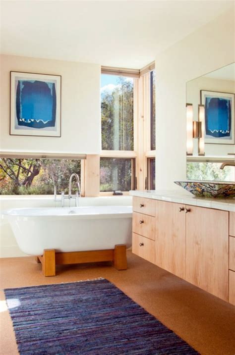 The light wood furniture and white fixtures bring a needed touch of light, color, and organic feel. Modern bathroom ideas and trendy bathroom furniture | Interior Design Ideas | AVSO.ORG