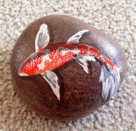 Beautiful Koi Fish Painted On River Rocks To Look Like The Fish Are