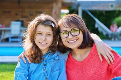 Portrait Of Happy Mom And Teenage Daughter Looking At Camera Stock Image Image Of Daughter