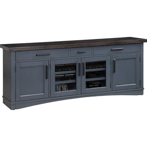 A Large Entertainment Center With Two Doors And Three Drawers On The