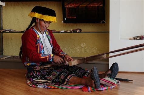 Peruvian Indigenous Woman Is Weaving A Carpet Editorial Stock Photo