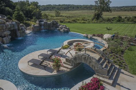 These pool designs also feature unique ideas for waterfalls it's even better when that swimming pool is in your own backyard. Pool Island Featuring Sunken Fire Pit - Pool - Chicago ...