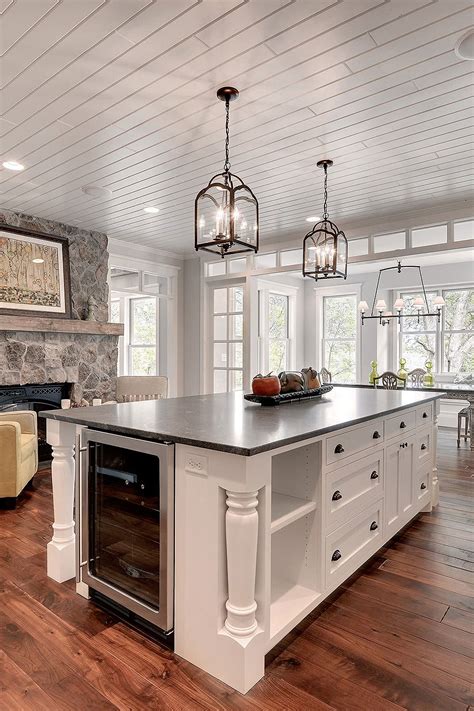 The lighting fixture enhances the luxurious look of this gray kitchen! Topmost Kitchen Backsplash Black Granite Countertops White ...