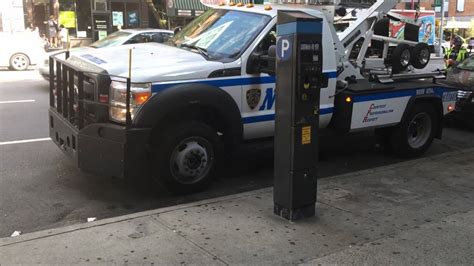 Newer Nypd Traffic Division Tow Trucks Picking Up Illegally Parked Car