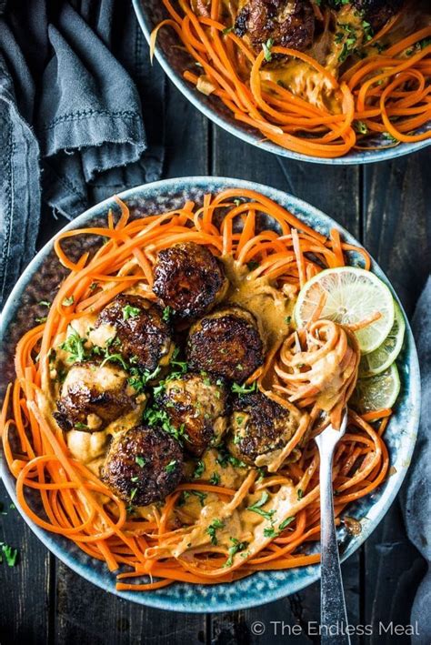 The kids help mold the chicken meatballs, while mommy and daddy alternately cook the soup. Thai Chicken Curry Meatballs with Carrot Noodles | Recipe | Curry meatballs, Thai chicken curry ...