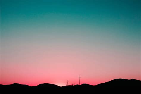 Download Blue Pink Mountains Sunset Desktop Wallpaper
