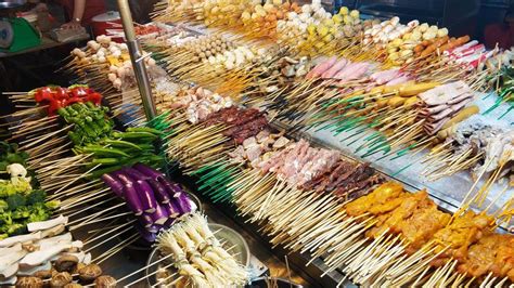It's far from the best i have ever eaten but the food is consistently good and it is prepared super quick. Traditional Fried Chinese Food On Sticks At Street Vendor ...