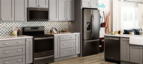 Black stainless is an oxide coating that. Whirlpool Appliances Black Stainless w/ Light Gray Cabinets & Patterned Backsplash. Pho ...