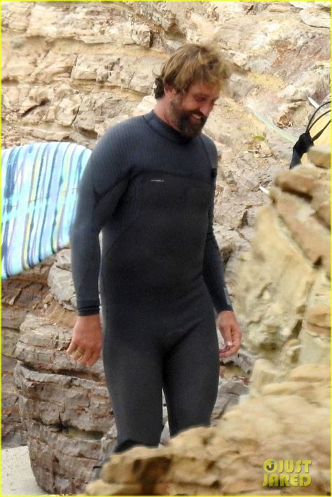 Gerard Butler Puts On His Skintight Wetsuit For A Day Of Surfing Photo