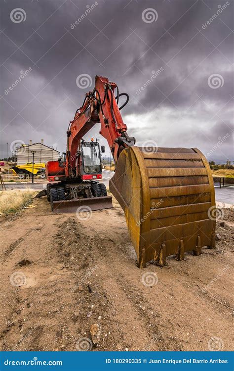 An Orange Bulldozer At A Construction Site Stock Image Image Of