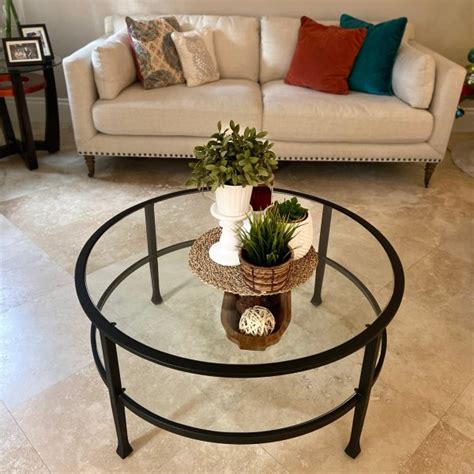 Perfect for showcasing collectibles or displaying books, the tanner rectangular coffee table has streamlined shapes that work great in smaller spaces. Tanner 36" Round Coffee Table | Round glass coffee table ...