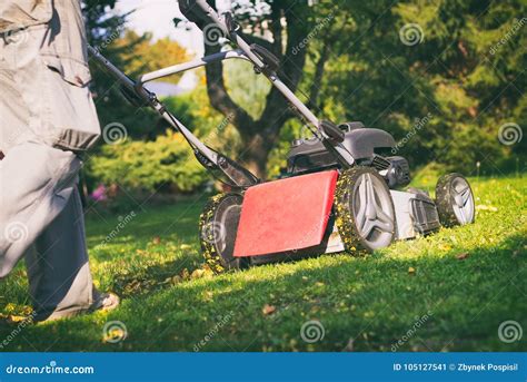 Man Mowing Lawn Royalty Free Stock Photography