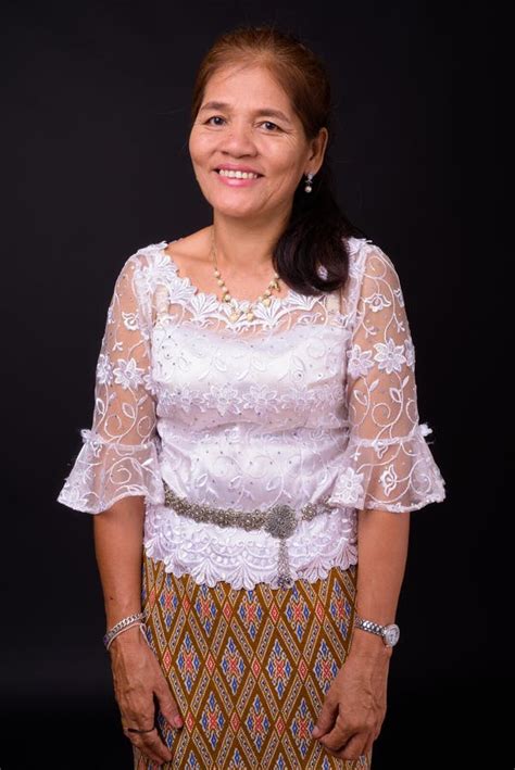 Mature Asian Woman Wearing Thai Traditional Clothes Against Black Background Stock Image Image
