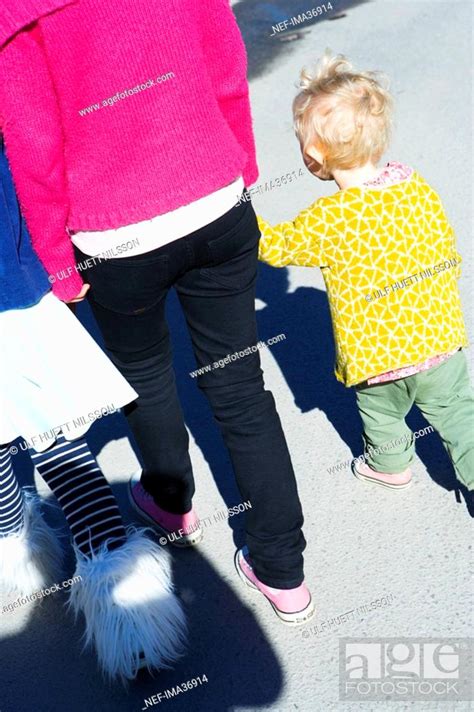 Three Girls Holding Hands Stock Photo Picture And Royalty Free Image
