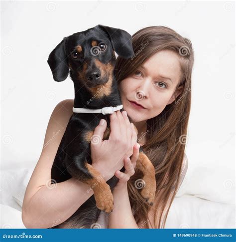 Woman Holding Her Dog Stock Photo Image Of Apartment 149690948