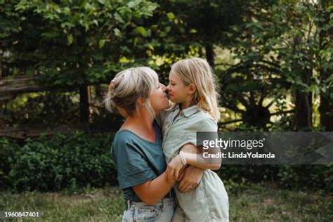 two girls rubbing each other photos and premium high res pictures getty images