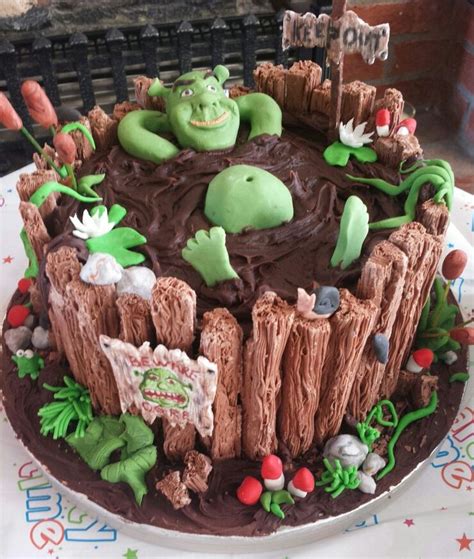 Flakes On The Outside Of A Swamp Cake Need A Gator Instead Of Shrek