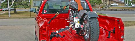 They are designed to be low and strong and hold the bikes securely. How to Safely Tie Down a Motorcycle | DiscountRamps.com