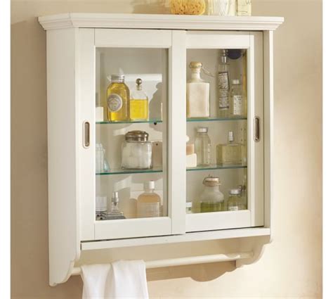 So it's part hinge, part stay. Sliding Door Wall Cabinet | Pottery Barn