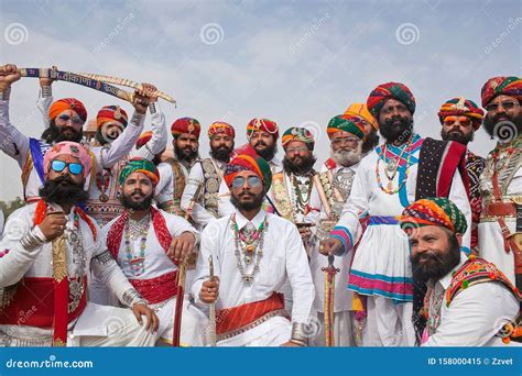 Indian Rajasthani Men With Long Mustaches In National Clothes During Camel Festival In Rajasthan