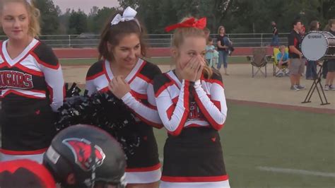 cheerleader with cancer gets surprise show of support from high school football team