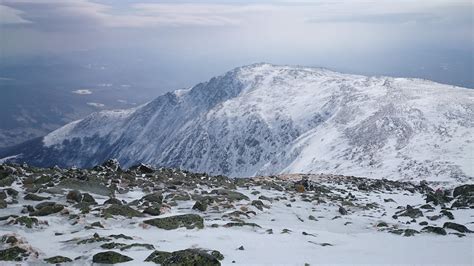 Looking At Mt Eisenhower While Summiting Mt Washington Behind New