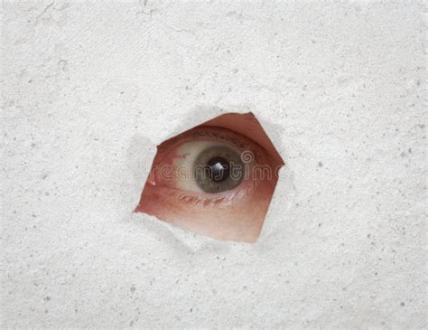 Eye Looking Through Hole In Gray Wall Stock Image Image Of Concrete Single 16897743