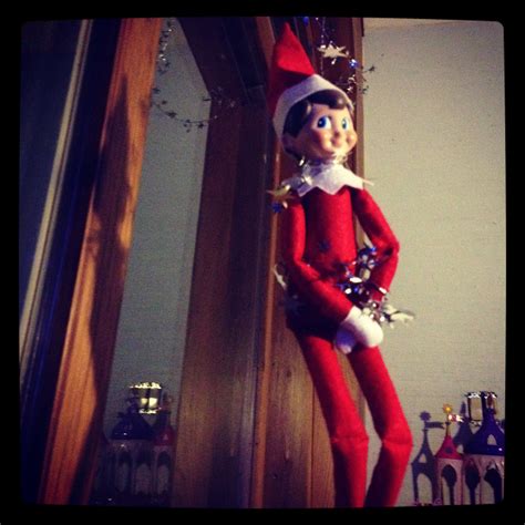 our elf appeared tonight tangled in the christmas decorations elf holiday decor decor