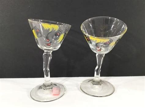Two Tipsy Martini Glasses Hanford Auction House