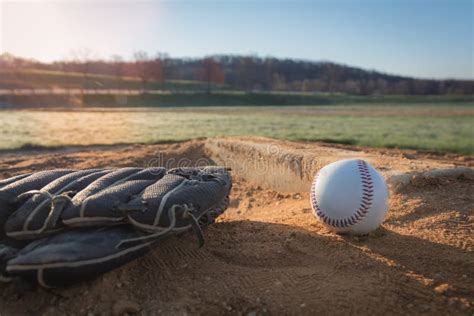 Baseball Glove And Ball On Pitcher S Mound Stock Photo Image Of