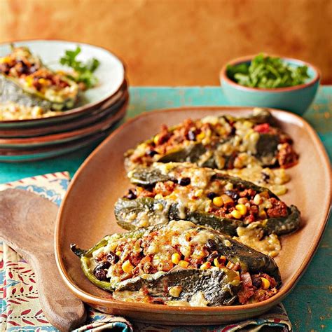 Corn And Chorizo Stuffed Poblanos With Green Chile Cheese Sauce