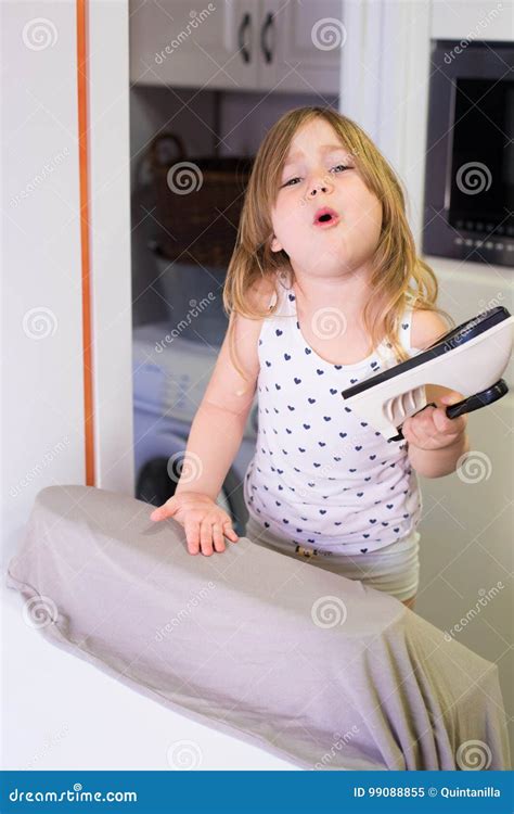 Little Girl Ironing In Kitchen And Complaining Stock Image Image Of