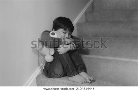 Sad Boy Sitting Alone On Staircase Stock Photo 2104614446 Shutterstock