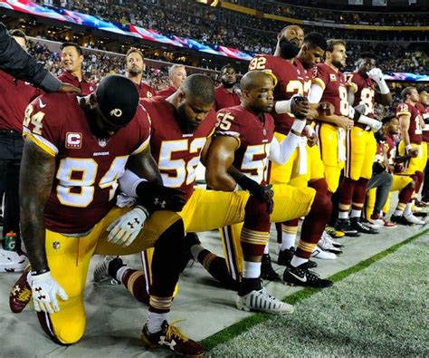 after trump blasts n f l players kneel and lock arms in solidarity the new york times