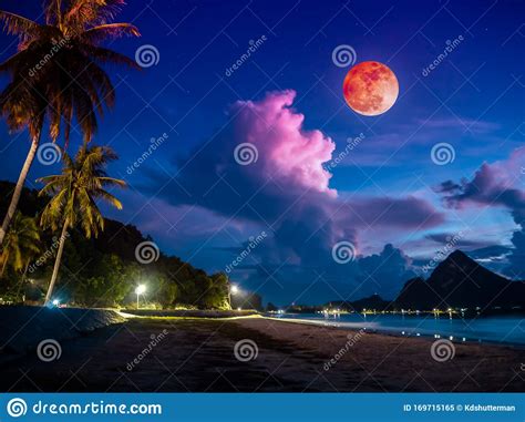 Colorful Blue Sky With Cloud And Bright Full Moon On Seascape To Night
