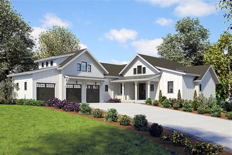 Modern Farmhouse Plan With Bonus Room Above A 3 Car Garage 23868jd