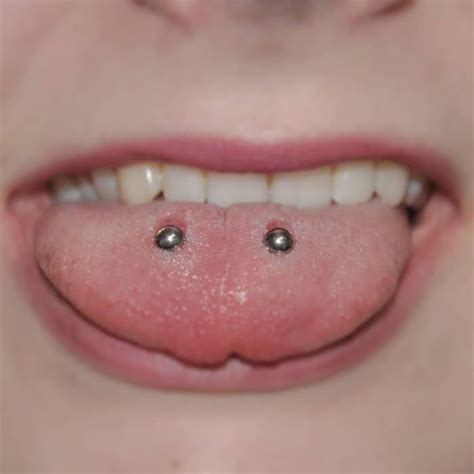 Snake Eye Piercing Ideas With Pain Info Aftercare Guide Wild Tattoo Art
