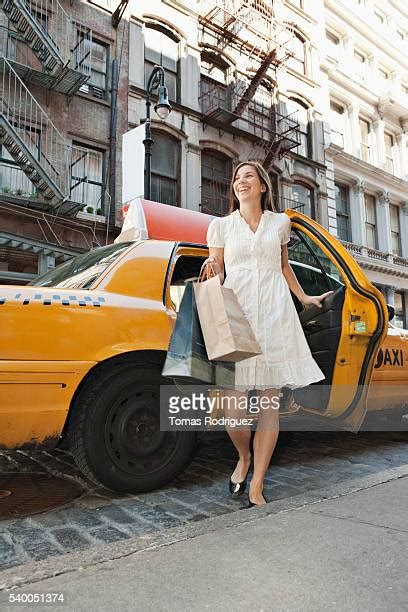 Exiting Taxi Photos And Premium High Res Pictures Getty Images